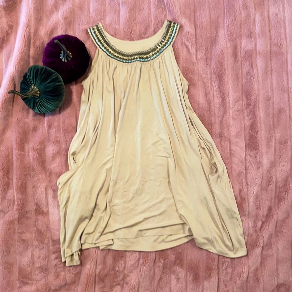 Cream colored tunic shirt with beautiful detail